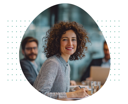 Woman looking into camera and smiling.